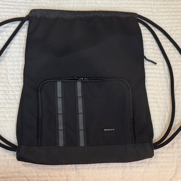 Oakley Black Drawstring Backpack with Gray Camo Accents - Picture 1 of 4